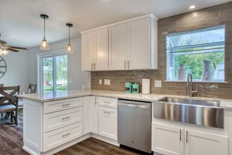 Chef’s Paradise: Prepare your favorite meals in a fully equipped, modern kitchen boasting state-of-the-art appliances and sleek countertops.