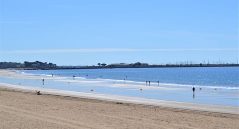 On the beach, sun loungers