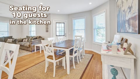 Seating for 10 guests in the dining room and at kitchen island. S