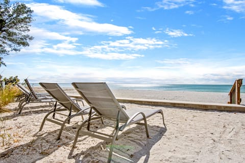 On the beach, sun loungers, beach towels