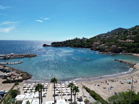 On the beach, sun loungers, beach towels