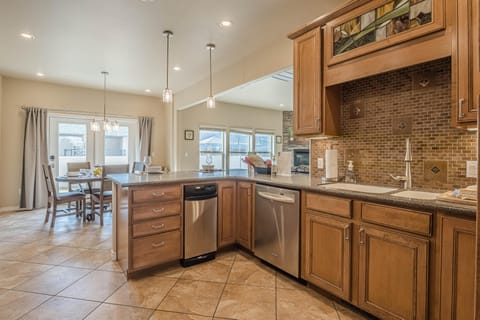 Spacious kitchen with plenty of counter space, perfect for cooking and entertaining.