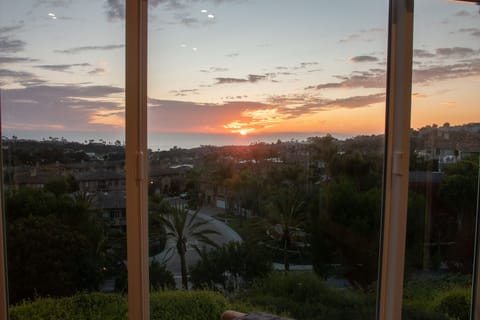 The living room window provides breathtaking views from inside.