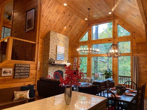 Ahhh these windows! Experience all the outside seated by the cozy fire inside.