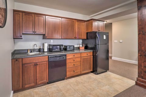 Full-size fridge, microwave, stovetop, dishwasher