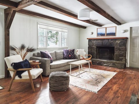 Living area | Smart TV, fireplace, books, stereo