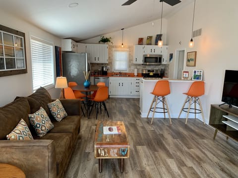 Beautiful living area with a high ceiling and open floor layout