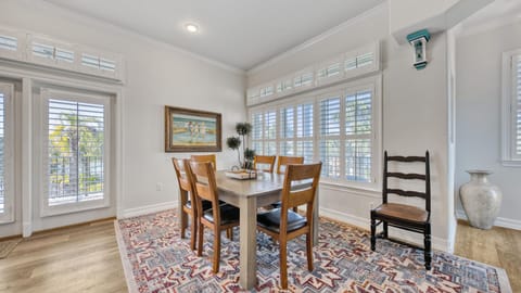 view of west dining, front door to right