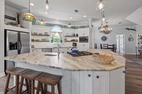 Kitchen: pantry on right and front door at foyer on left.