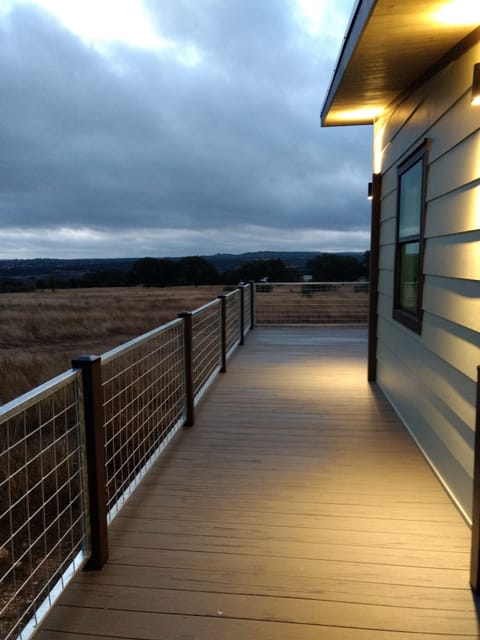Lighted deckway wraps around a memory making stay. 
