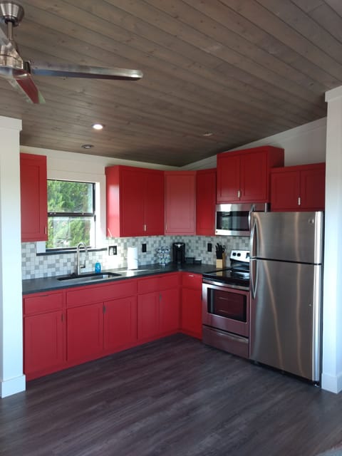 Full kitchen stocked with cookware, flatware and stemware.  K- cup brewer.