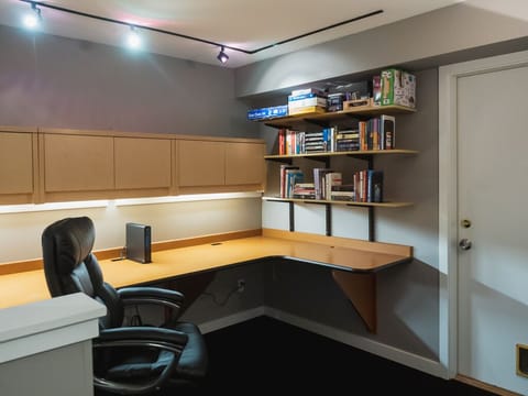 designated office space/library with plenty of books and board games to enjoy