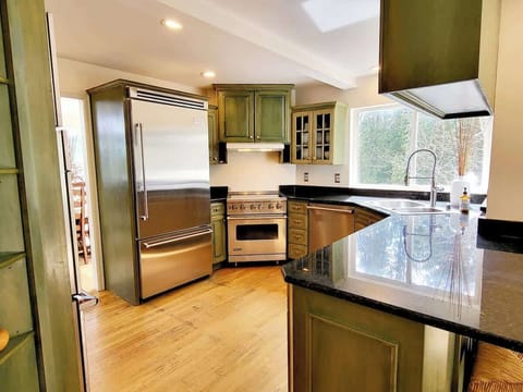 Gourmet kitchen which includes 3 convection ovens!