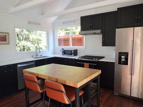 Kitchen island with two stools