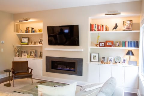 TV, fireplace, books, stereo