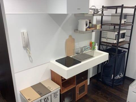 Fridge, microwave, cookware/dishes/utensils