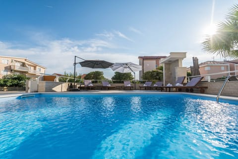 Outdoor pool, sun loungers