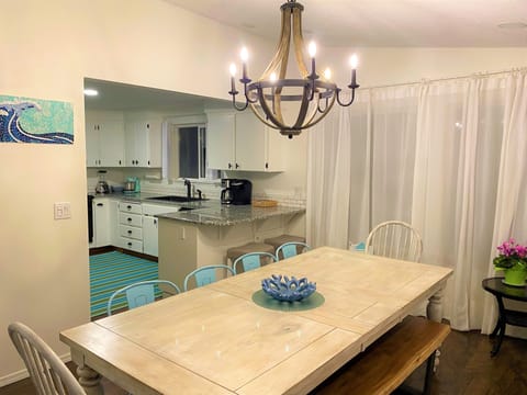 A table that fits the whole gang makes dinner fun & perfect for game night.