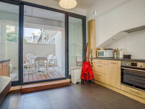 Cabinetry, Property, Furniture, Building, Countertop, Wood, Kitchen Appliance, Door, Lighting, Interior Design