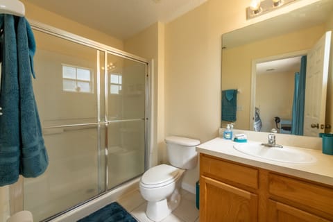 Combined shower/tub, hair dryer, towels, soap