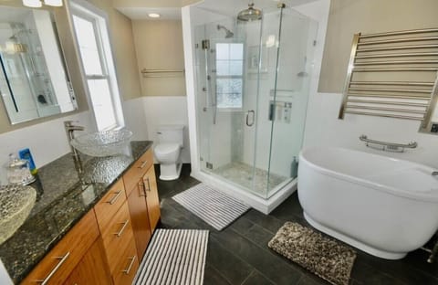 Combined shower/tub, toilet paper