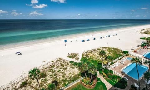 On the beach, sun loungers, beach towels