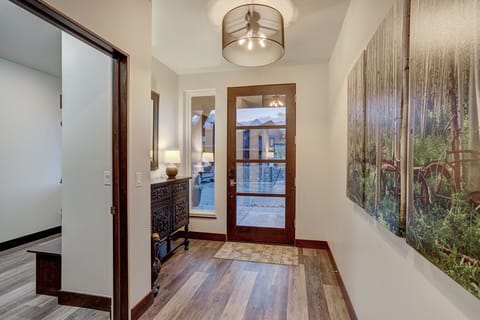Front foyer entry with glimpse of mudroom on your left