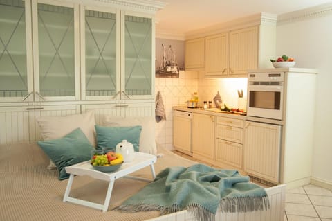 Kitchen area. functional wall bed