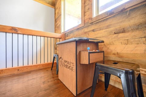 Arcade table with 400 games including Pac Man, Galaga, Donkey Kong, Frogger, and Centipede.