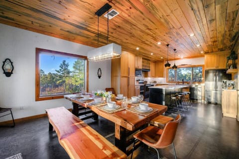 Modern rustic designed kitchen and dining area with seating for 14.