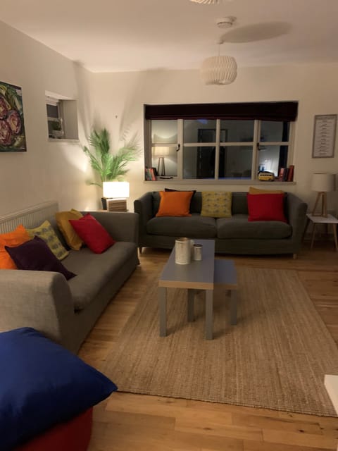 Lounge with two patio doors. Smart TV