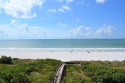 On the beach, sun loungers, beach towels