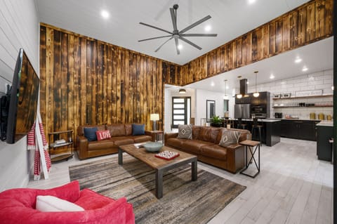 Wooden details in the living room give it a rustic-modern twist.