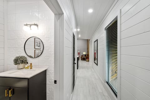 A half bath is also available for guest convenience.