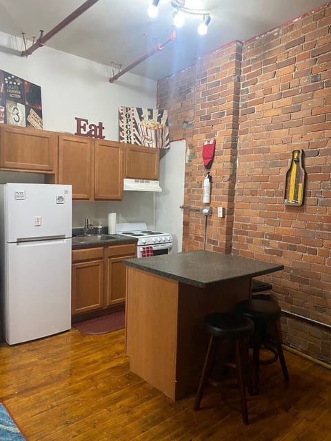 A clean kitchen for you to host a small intimate dinner.