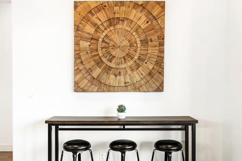 3-seat bistro bar adjacent to kitchen