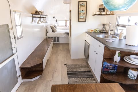 Trailer with mini fridge, sink, coffeemaker, tea kettle and tea