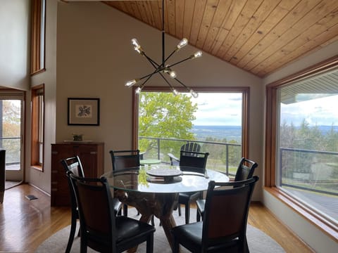 Dining Room. Huge picture windows. Table seats six. Counter bar seats three. 