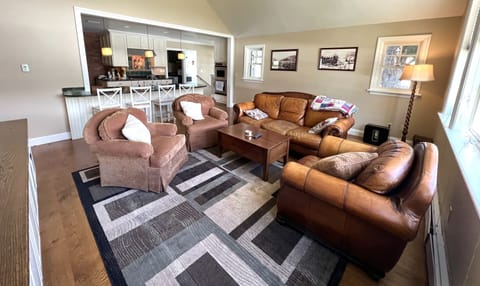 TV room, with kitchen in background.