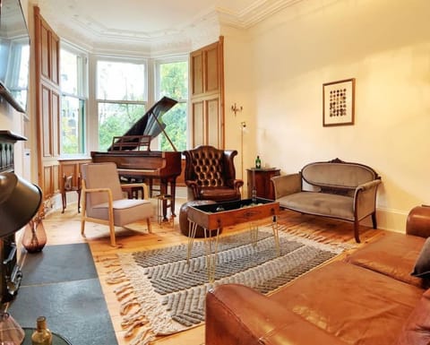 Classically decorated lounge area with grand piano