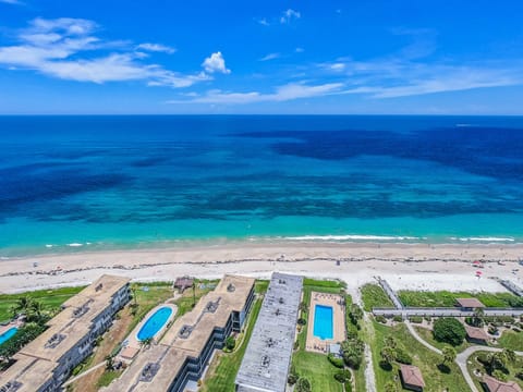 On the beach, sun loungers, beach towels