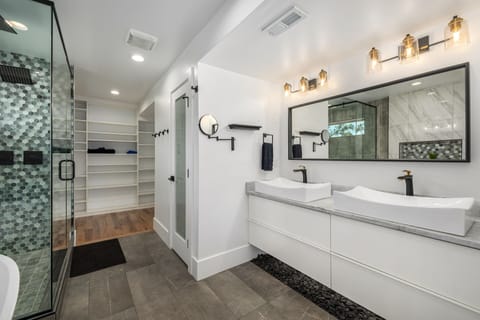 Combined shower/tub, hair dryer, towels, toilet paper