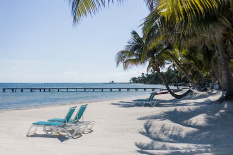 On the beach, sun loungers, beach towels