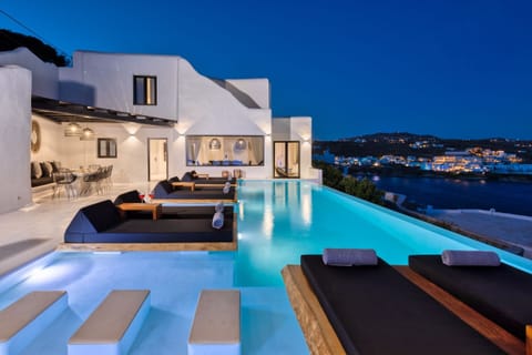 Outdoor pool, an infinity pool, sun loungers