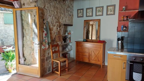 View of kitchen and terrace (kitchen door is south facing).