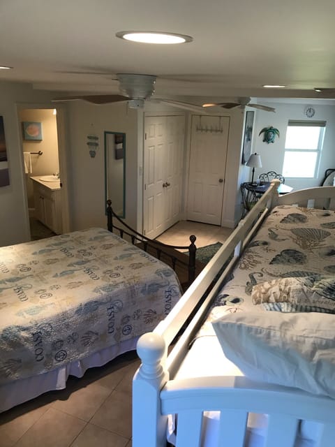 Lower area w/ Queen bed, twin bunks, central A/C, HDTV w/basic cable.
