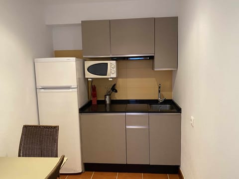 Fridge, microwave, toaster, cookware/dishes/utensils