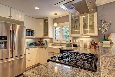 Sunny, welcoming kitchen equipped with everything you will need. It's a clean, cheerful space that is fully stocked for our guests.