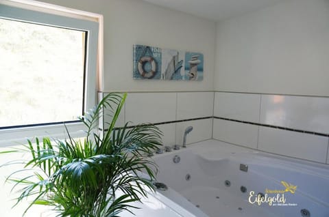 Shower, jetted tub, towels, soap