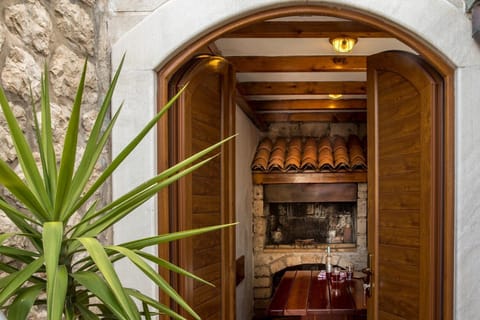 Traditional “konoba” with grill of Croatia luxury seafront villa for vacation with family and friends in Dubrovnik